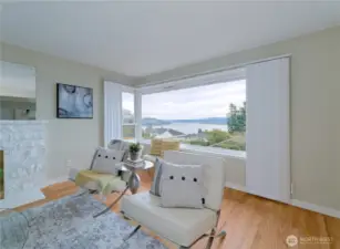 Main floor living room, hall and bedrooms with original oak hardwood floors.