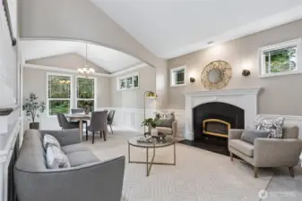 The formal living and dining areas are graciously designed, offering timeless design and welcoming atmosphere for entertaining.