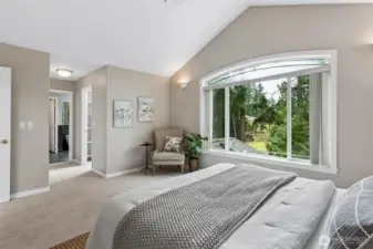 The suite offers ample space to accommodate a variety of furniture arrangements including possibly a wall mounted TV or comfortable sitting and reading area.