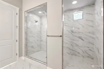An Amazing walk-in shower with dual shower heads - picture from actual home for sale