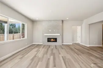 Floor to ceiling stone around fireplace - picture from actual home for sale
