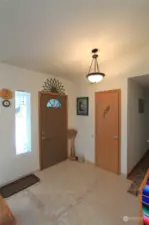 Experience the luxury of heated tile floors in this stunning entryway. Perfect for cold mornings, the beautifully tiled floor adds both style and comfort as you welcome guests into your home.