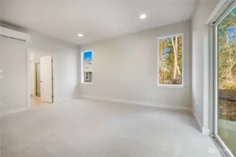 Primary bedroom with sliding door to the patio