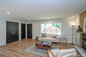 Beautiful doors with fine brass finishes complement the home.