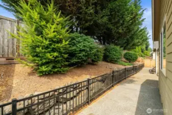 Rock wall w/Metal Fencing