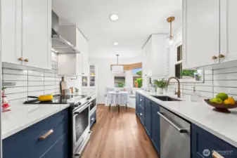 A sleek kitchen renovation completed in 2021 offers both style and functionality.