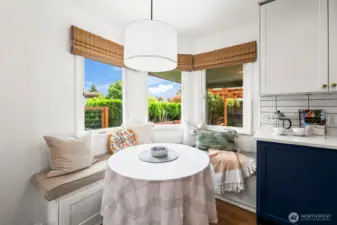 Don’t miss the charming built-in breakfast nook—a perfect spot for casual meals or morning coffee.