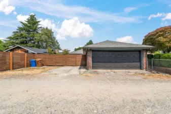 View of the garage and additional parking accessible from the alley.