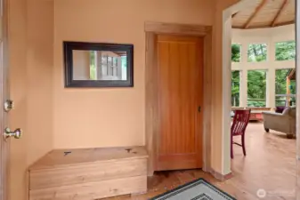 Off the entry there is a mud room with a utility sink (behind this sliding door).