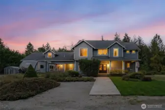 Front view of this stunning Craftsman-style home on nearly 22 acres.