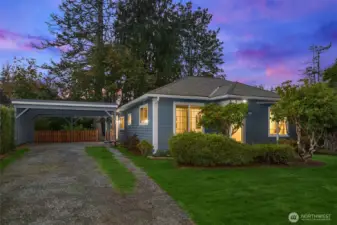 Evening view of the front of the home.