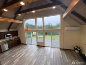 from the loft area looking toward kitchen. All windows and sliding doors are brand new!