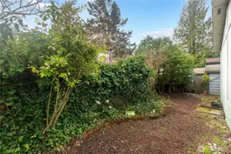 Beautiful fenced in backyard garden area