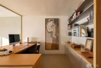 Walnut desk and counter, Knoll cabinets, 1/4" custom metal book shelves, locking drawers, diamond coat plastered walls around .