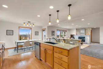 Kitchen flows easily into everyday dining area and family room.