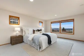 Primary bedroom offers a relaxing space to unwind.