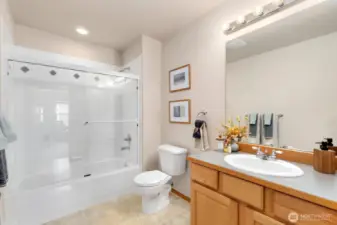 Another upper level full bath sits across from bonus room / 5th bedroom.