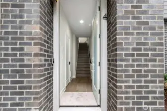 Front covered entry. Garage and flex space on right side.