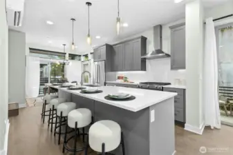 Extra long island that seats 5-6 people! Gas cooking.