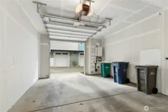 Tandem 2 car garage with EV charging!