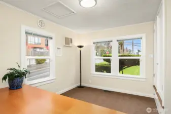Main level bedroom with closet and built-ins