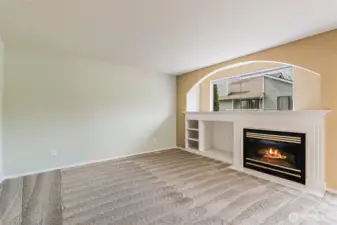 Natural gas fireplace, TV nook.