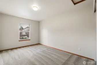 Third bedroom, upper level, at front of home.
