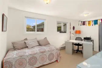 This room can easily be made into two bedrooms.