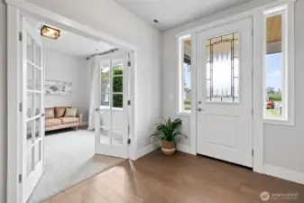 Welcoming, light-filled and spacious entry way offers immediate sense of openness and warmth.