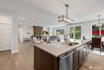 Large enternaining area kitchen to living room.