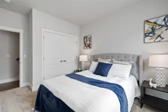 Second bedroom thoughtfully positioned near main bathroom combining privacy and convenience.