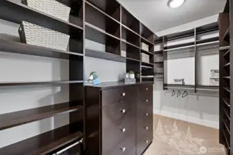 California Closets custom walk-in offers seamless combination of practicality and sophisticated design.