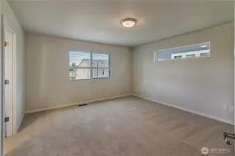 Photos are taken of a Shelby plan previously built in the community.