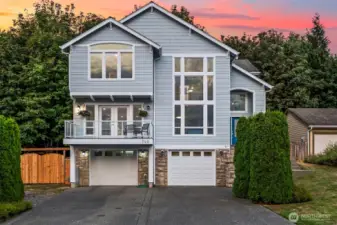 Rare 4-car tendem garage offers abundant or use for workshop, gym or hobbies.