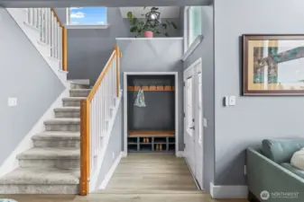 Front entrance has a custom bench with built-in storage.