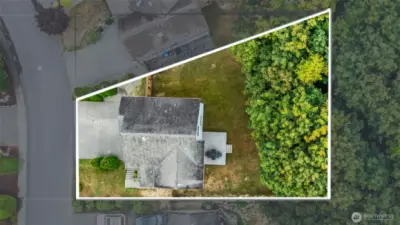 Property line goes beyond the fenceline into the greenbelt.