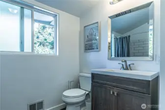 Updated large bathroom on upper level.