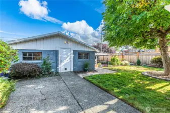 Detached 2 car garage with extra shop area.