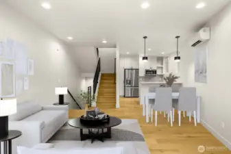 Main living space connects dining, living & cooking into one large great room. Creating a natural gathering place making entertaining a breeze. This image is virtually staged.