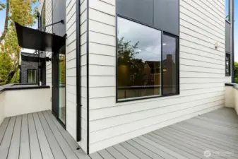 Main level wrap-around deck, perfect for morning coffee in the fresh air.