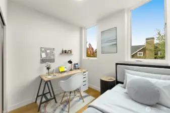 Upstairs you'll find a Second bedroom. This image is virtually staged.