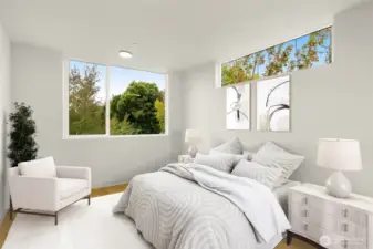 Roomy primary, with natural light flooding in above your bed. This image is virtually staged.