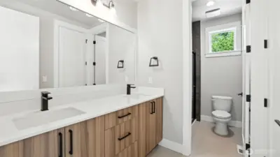 Jack-and-Jill 3/4 Bath, shared between 3rd and 4th Bedrooms on the Upper Level.