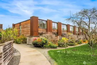 This photo shows the back of the deck, which can be accessed from a set of stairs to a path