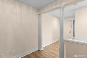 Looking toward entry door from office area.