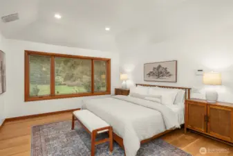 Your primary suite has hardwood flooring and built in speakers