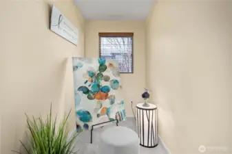 Upper level loft area great for office work area.