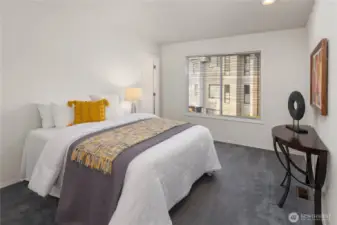 Upper-level bedroom w/walk-in closet & en suite bathroom