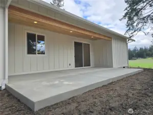 Covered Concrete Patio with Pine Ceilings and Recessed Lighting