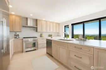 Solid oak cabinetry and upper end appliances including Thermador and Wolf